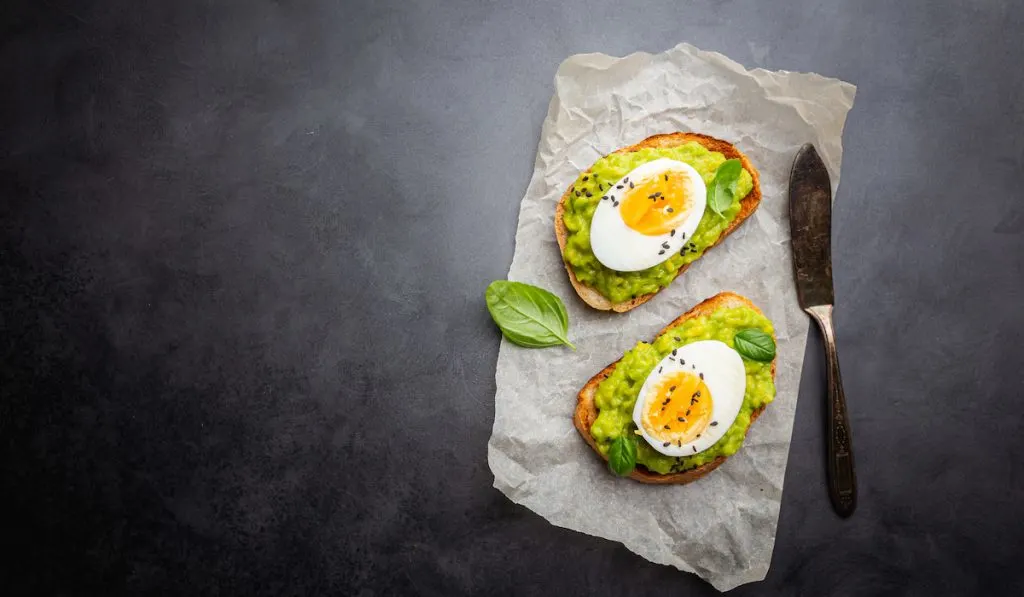 avocado toast with sunny side up eggs