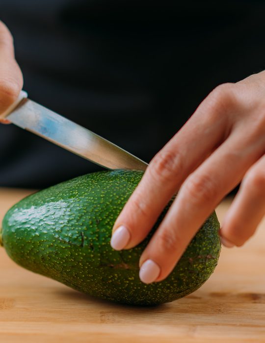 cutting fresh avocado